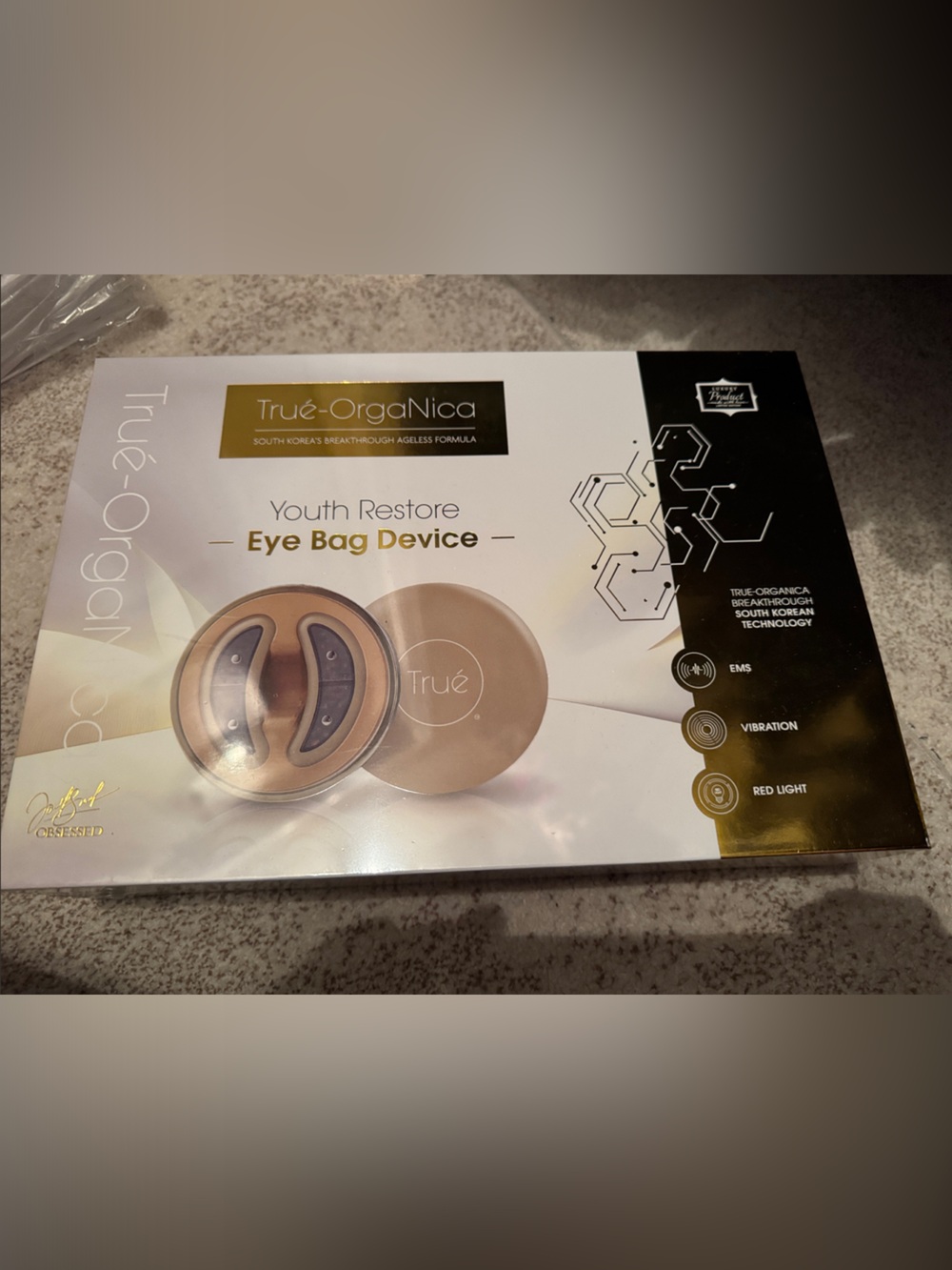True-OrgaNica Youth Restore Eye Bag Device — Gold